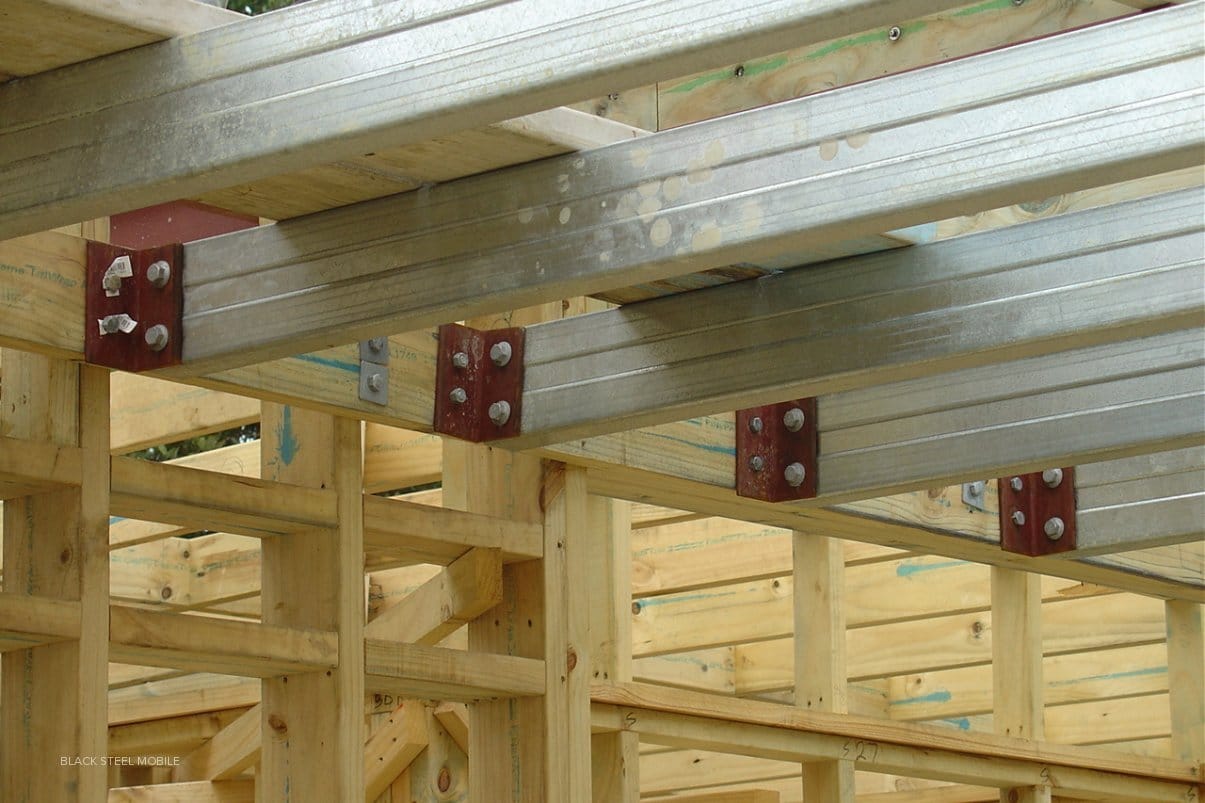 Structural steel roof supports from below