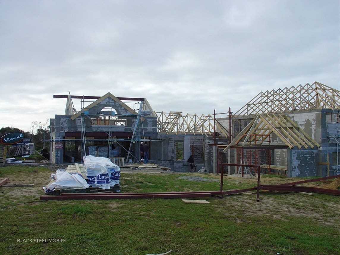 Steel portal frames, mid-span beams